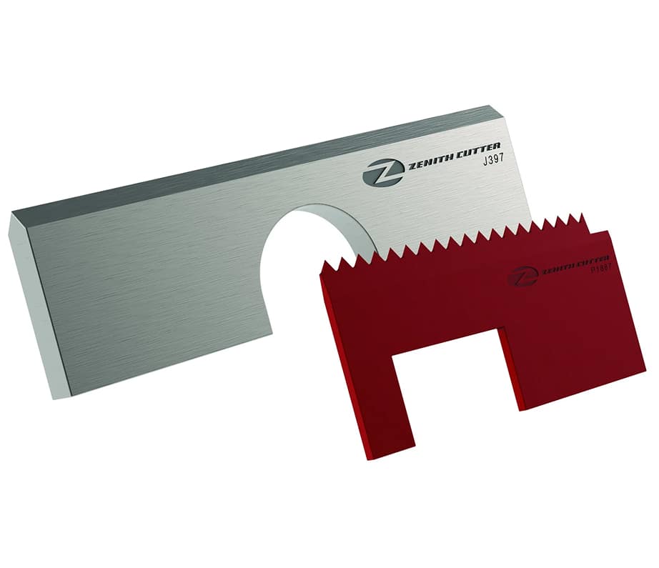 Two razor blades on a surface