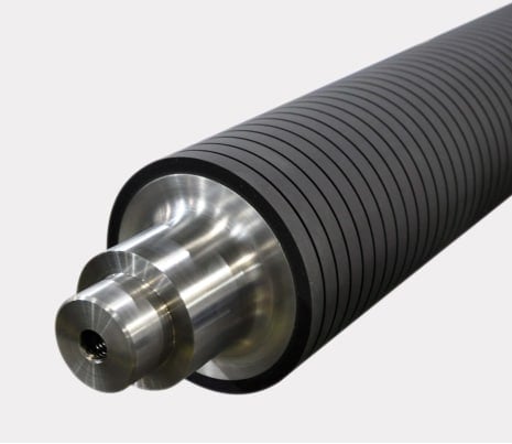 Metal roller with textured surface